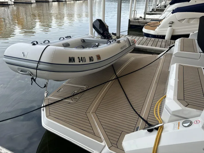 Yacht Rock Yacht Photos Pics Inflatable boat docked beside 2015 Cruisers Yachts 390 Express Coupe.