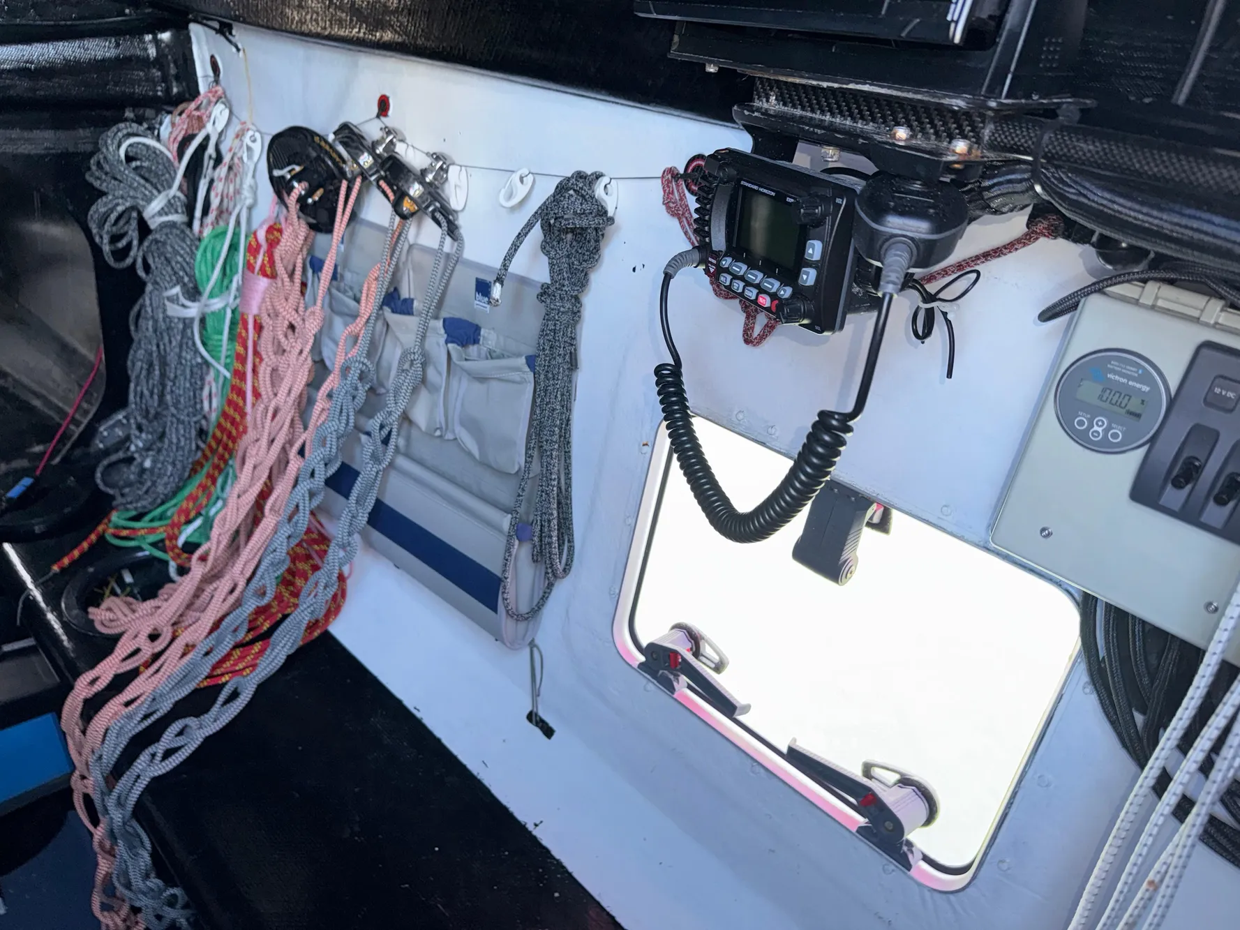 Interior of a 2015 Marstrom Seacart 30 sailboat with ropes and navigation equipment.