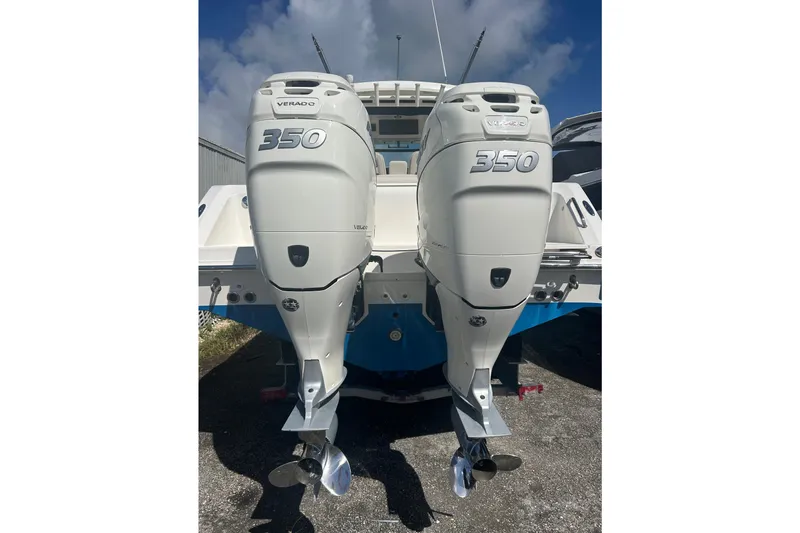 Overtime Yacht Photos Pics 2018 Boston Whaler 330 Outrage with twin 350 Verado engines, rear view.