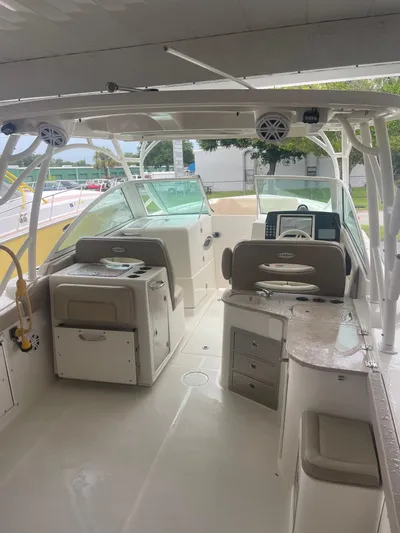 Yacht Photos Pics 2019 Sailfish 325 Dual Console boat interior with seating and storage.