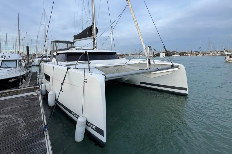 Lupa Di Mare Yacht Photos Pics 2021 Fountaine Pajot Saona 47 catamaran docked in a marina.