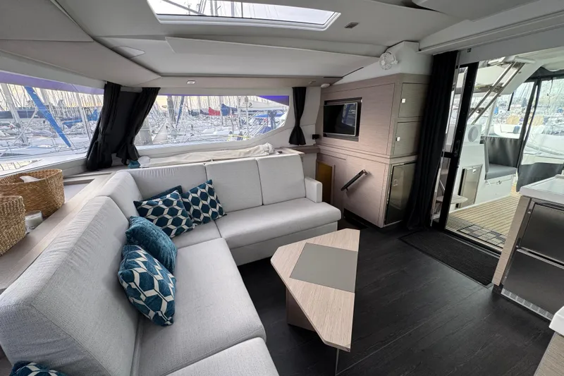 Lupa Di Mare Yacht Photos Pics Luxurious interior of 2021 Fountaine Pajot Saona 47 catamaran with modern furnishings.