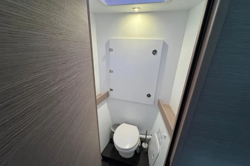 Lupa Di Mare Yacht Photos Pics Modern bathroom in 2021 Fountaine Pajot Saona 47 yacht, featuring sleek design and compact layout.