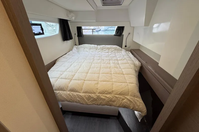 Lupa Di Mare Yacht Photos Pics Cozy bedroom in 2021 Fountaine Pajot Saona 47 catamaran with a comfortable bed.