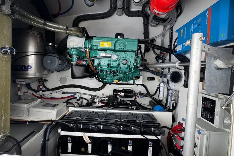 Lupa Di Mare Yacht Photos Pics Engine room of 2021 Fountaine Pajot Saona 47 catamaran with visible machinery and equipment.