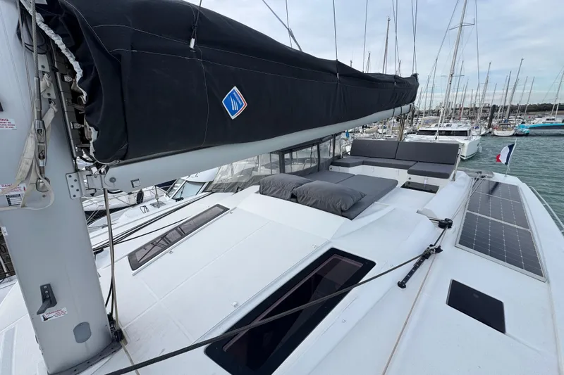 Lupa Di Mare Yacht Photos Pics 2021 Fountaine Pajot Saona 47 catamaran with solar panels and spacious deck in marina.