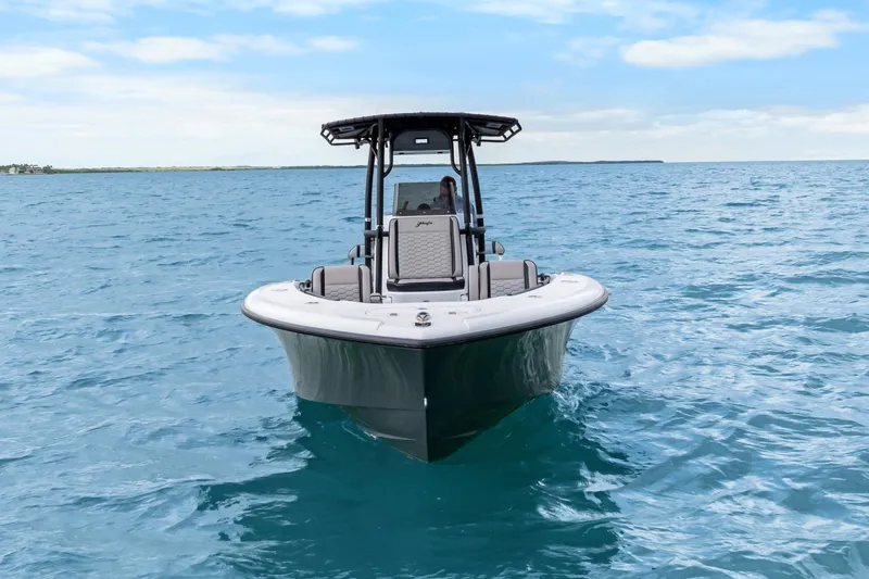  Yacht Photos Pics 2024 Yellowfin 26 Hybrid boat on open ocean under blue sky.