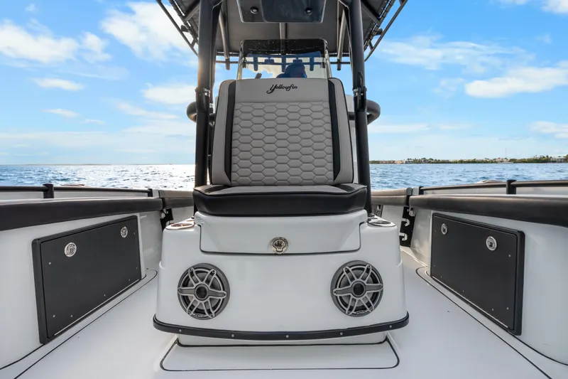  Yacht Photos Pics 2024 Yellowfin 26 Hybrid boat interior with seating and ocean view.