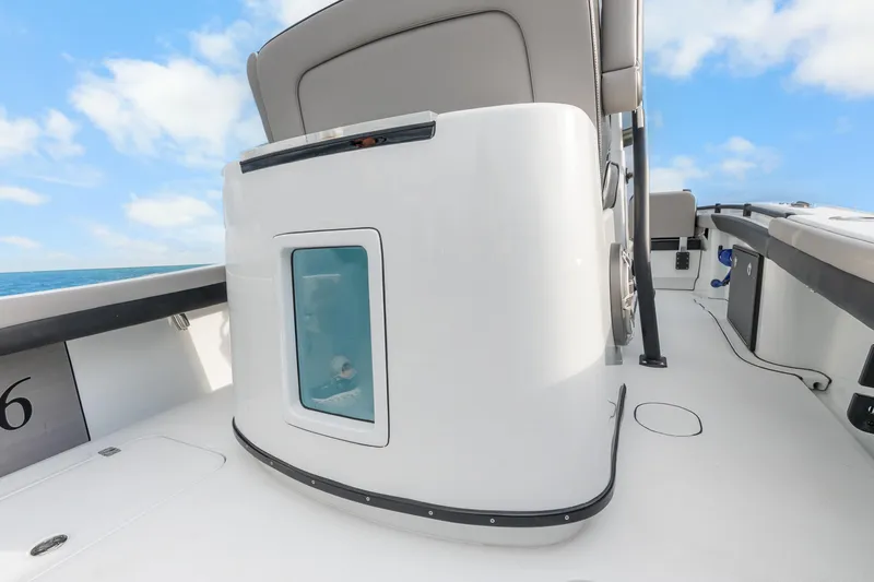  Yacht Photos Pics 2024 Yellowfin 26 Hybrid boat interior with sleek design and ocean backdrop.