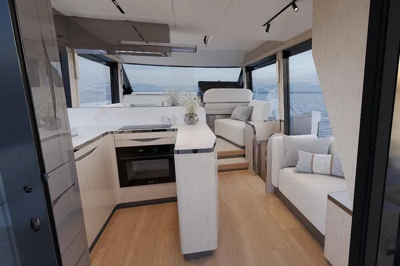  Yacht Photos Pics Luxurious interior of 2027 Galeon Yachts 520 FLY with modern kitchen and seating area.