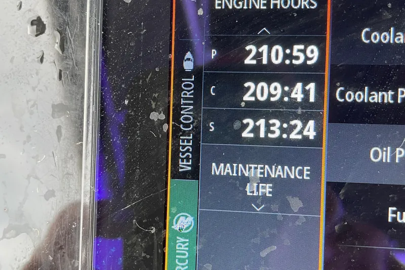  Yacht Photos Pics Display screen showing engine hours and maintenance life on a 2016 Chris-Craft Launch 36.