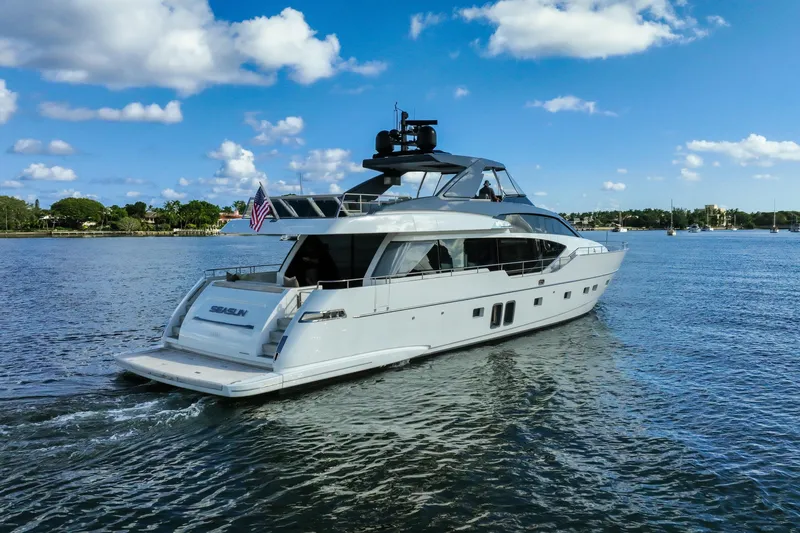 Seasun Yacht Photos Pics 2016 Sanlorenzo SL86 yacht cruising on a sunny day with blue skies.