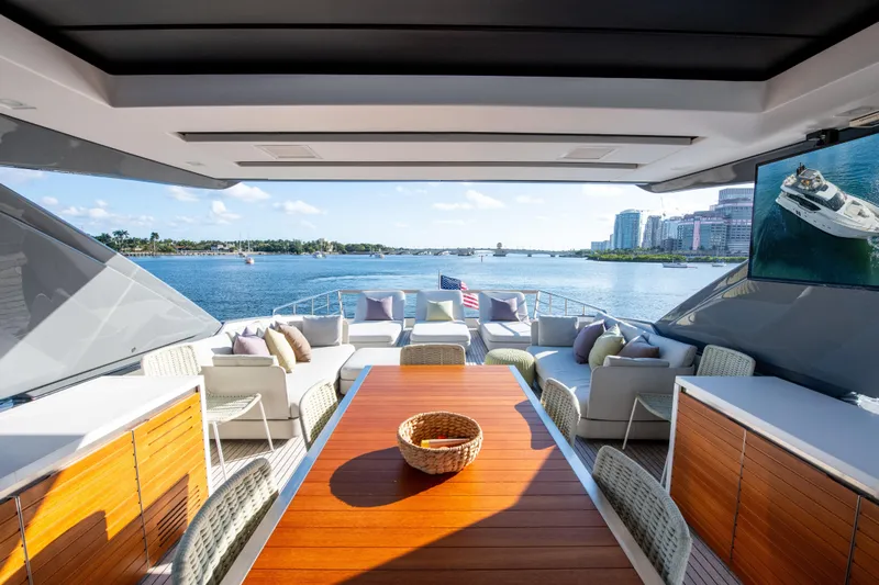 Seasun Yacht Photos Pics Luxurious 2016 Sanlorenzo SL86 yacht deck with elegant seating and waterfront view.