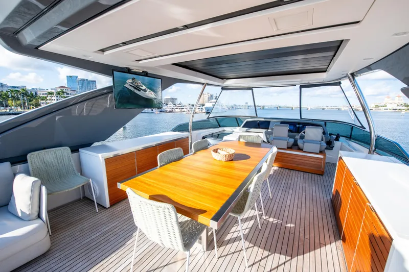 Seasun Yacht Photos Pics Luxurious 2016 Sanlorenzo SL86 yacht deck with elegant seating and dining area.