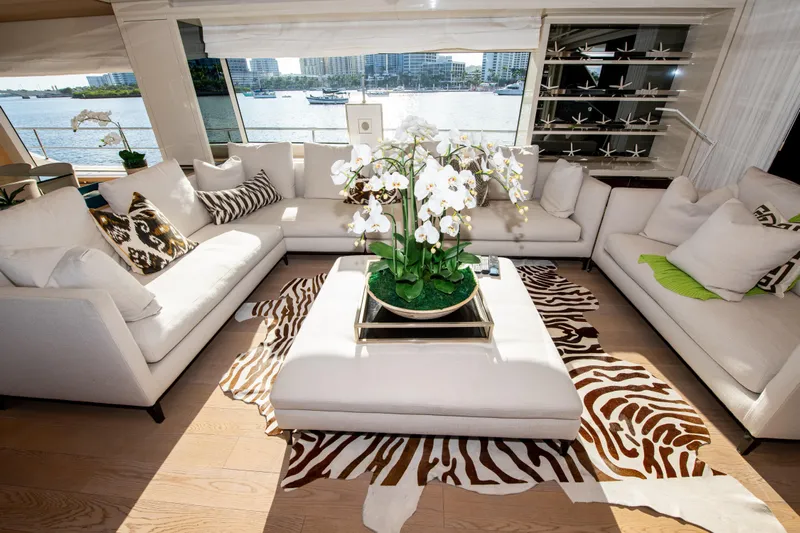 Seasun Yacht Photos Pics Luxurious Sanlorenzo SL86 yacht interior with elegant white sofas and zebra-patterned rug, 2016 model.