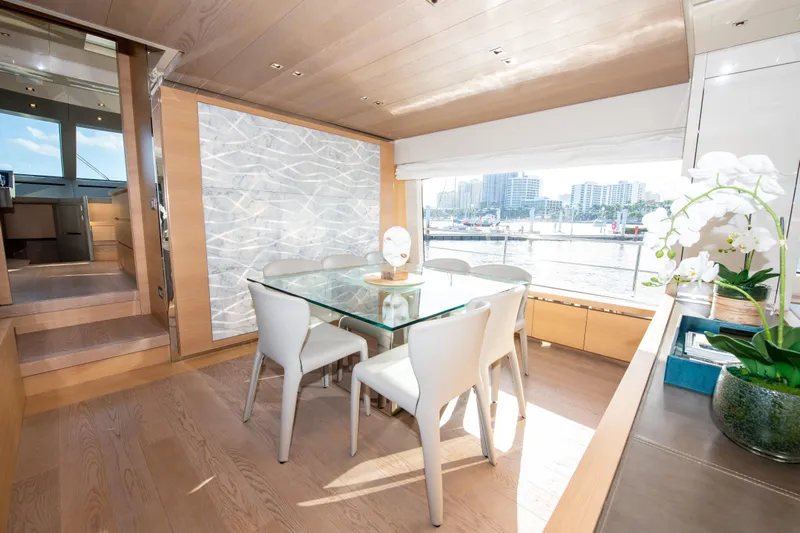 Seasun Yacht Photos Pics Luxurious interior of 2016 Sanlorenzo SL86 yacht with elegant dining area and waterfront view.