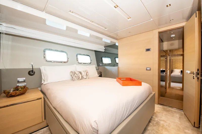 Seasun Yacht Photos Pics Luxurious bedroom interior of 2016 Sanlorenzo SL86 yacht with modern design and natural light.