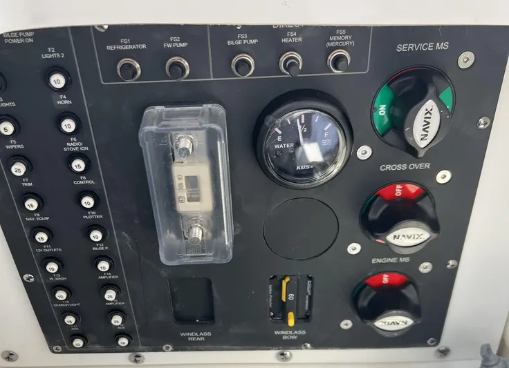 Chill Yacht Photos Pics Control panel of a 2025 Nimbus T8 boat with switches and gauges.