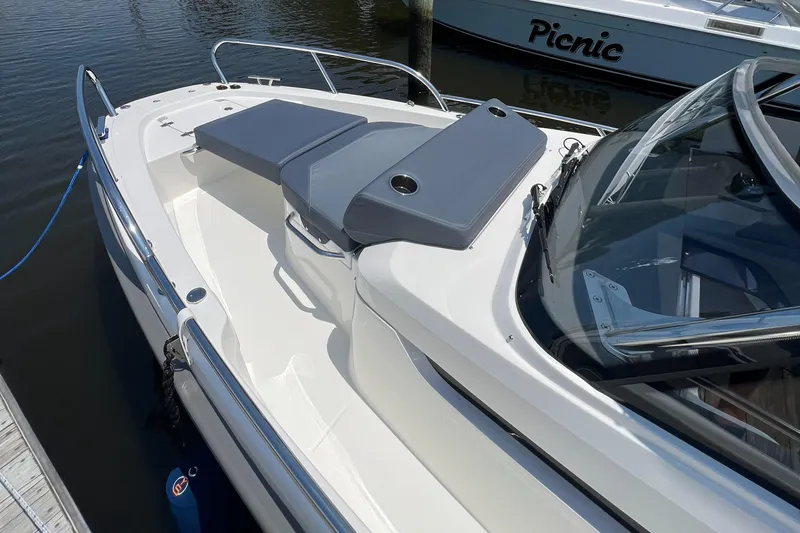 Chill Yacht Photos Pics 2025 Nimbus T8 boat with sleek design and comfortable seating on the deck.