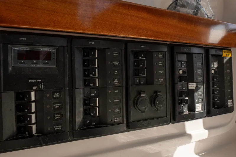 Challenger Yacht Photos Pics Control panel of a 2021 NorthCoast 315 HT boat with various switches and meters.