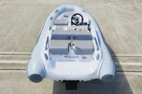 2023 AB Inflatables 350 XP boat on concrete surface, featuring sleek design and modern seating.