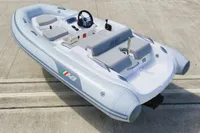 2023 AB Inflatables 350 XP boat on concrete surface, featuring sleek design and modern seating.