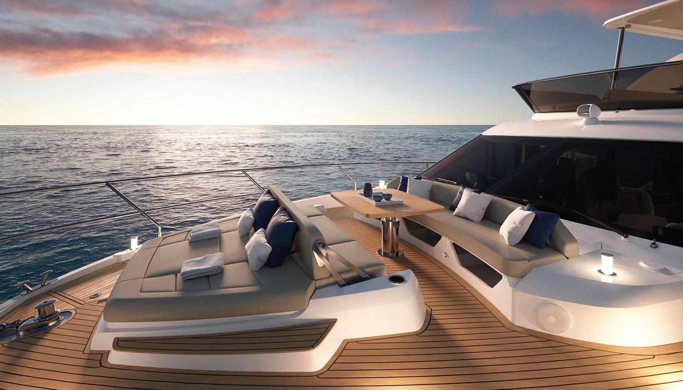 Luxurious 2025 Absolute 52 FLY yacht deck at sunset, featuring elegant seating and ocean views.