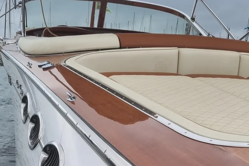  Yacht Photos Pics Luxurious 2010 J Craft Torpedo 42 yacht with elegant wood and cream upholstery detailing.