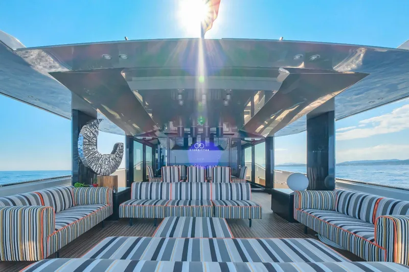 Eternity 44 Yacht Photos Pics Luxurious 2010 Arcadia Yachts 85 interior with striped seating and ocean view.