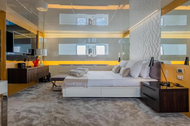 Eternity 44 Yacht Photos Pics Luxurious bedroom interior on 2010 Arcadia Yachts 85, featuring modern design and elegant furnishings.