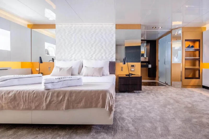 Eternity 44 Yacht Photos Pics Luxurious bedroom interior on 2010 Arcadia Yachts 85, featuring modern design and plush bedding.