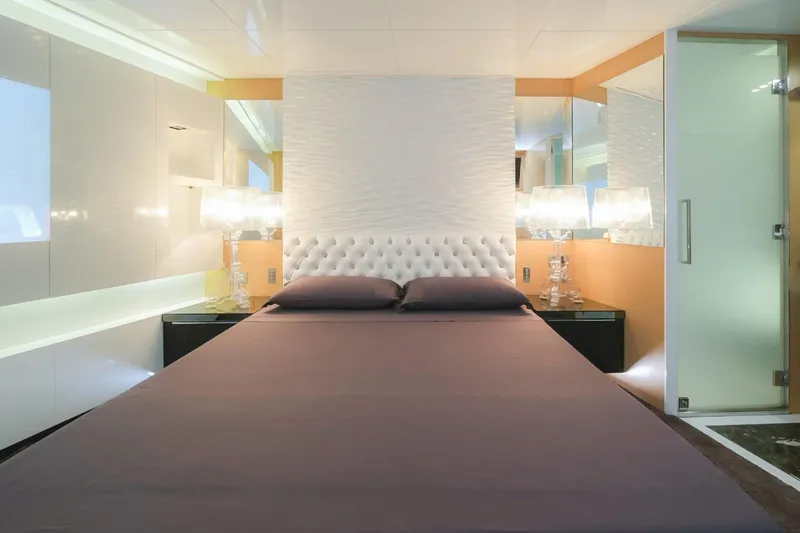 Eternity 44 Yacht Photos Pics Luxurious bedroom interior on 2010 Arcadia Yachts 85, featuring elegant design and modern furnishings.