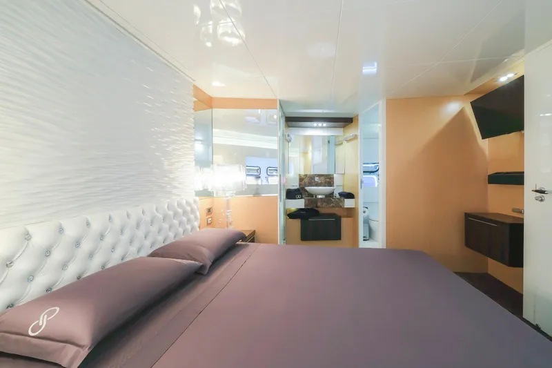 Eternity 44 Yacht Photos Pics Luxurious bedroom interior on 2010 Arcadia Yachts 85, featuring modern design and elegant furnishings.