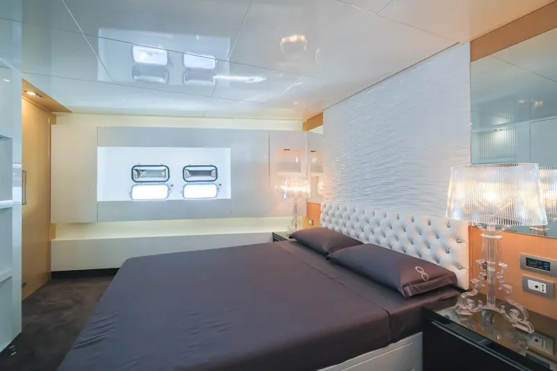 Eternity 44 Yacht Photos Pics Luxurious bedroom interior on 2010 Arcadia Yachts 85, featuring elegant design and modern amenities.