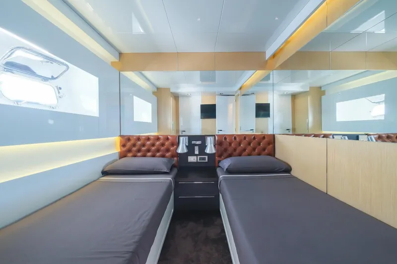 Eternity 44 Yacht Photos Pics Luxurious twin cabin interior on 2010 Arcadia Yachts 85, featuring modern design and elegant finishes.