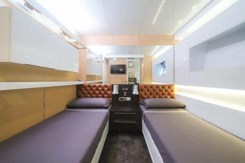 Eternity 44 Yacht Photos Pics Luxurious twin cabin interior on 2010 Arcadia Yachts 85, featuring modern design and ambient lighting.