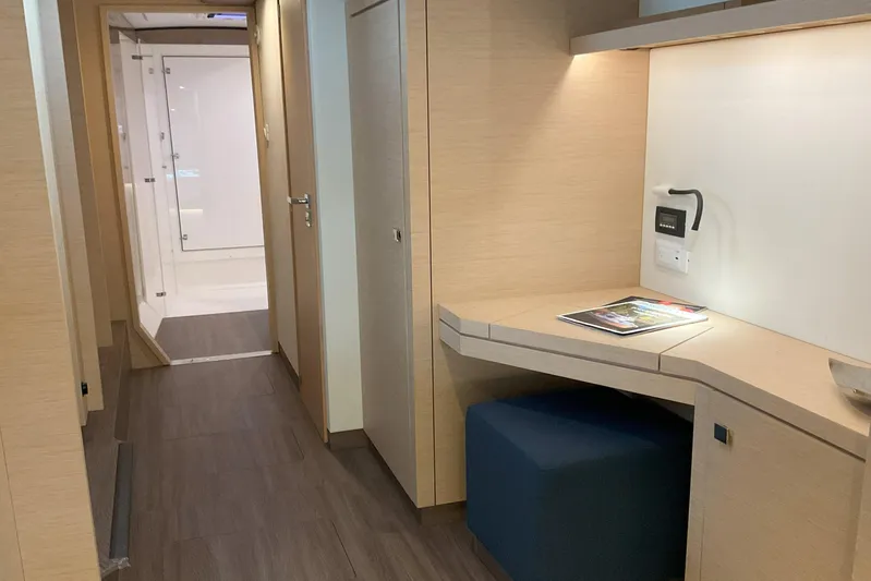  Yacht Photos Pics Interior of 2017 Fountaine Pajot Lucia 40 yacht with modern desk and hallway view.
