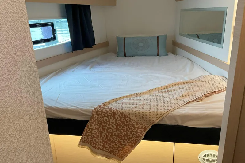  Yacht Photos Pics Cozy bedroom in 2017 Fountaine Pajot Lucia 40 catamaran with window view.