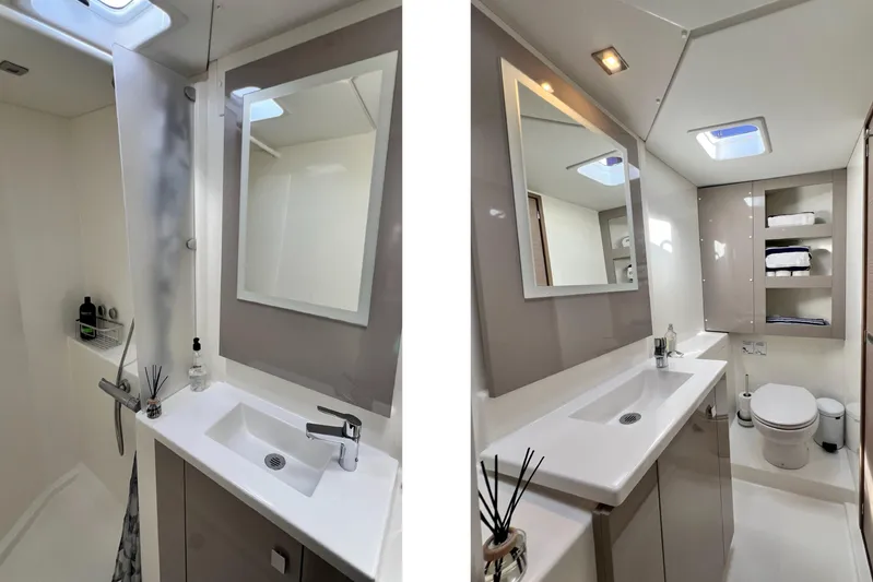  Yacht Photos Pics Modern bathroom interior of 2017 Fountaine Pajot Lucia 40 catamaran, featuring sleek design and amenities.