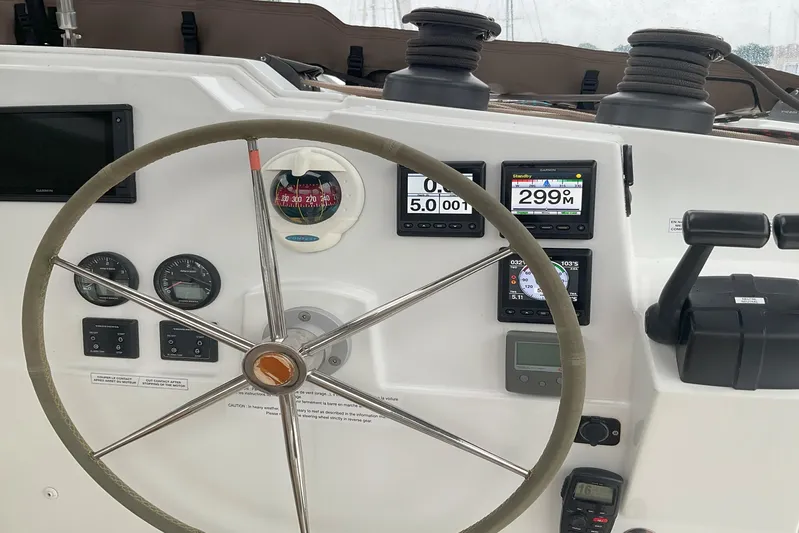  Yacht Photos Pics Helm of 2017 Fountaine Pajot Lucia 40 catamaran with navigation instruments and steering wheel.