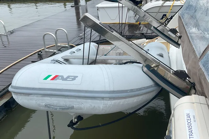  Yacht Photos Pics Inflatable dinghy on a 2017 Fountaine Pajot Lucia 40 catamaran at dock.