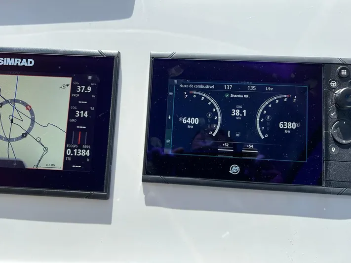 Elena Yacht Photos Pics Dashboard of 2023 Evolve 400HT with Simrad navigation and engine displays.