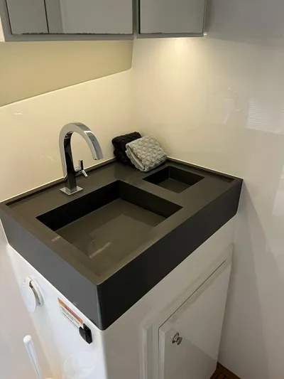 Elena Yacht Photos Pics Modern sink with sleek faucet in 2023 Evolve 400HT model, featuring minimalist design.