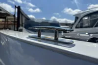 Chrome cleat on Rand Source 22 boat, 2023 model, under sunny sky.