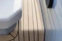 2023 Rand Source 22 boat interior with sleek, modern design and striped flooring.