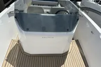 2023 Rand Source 22 boat cockpit with sleek design and modern steering console.