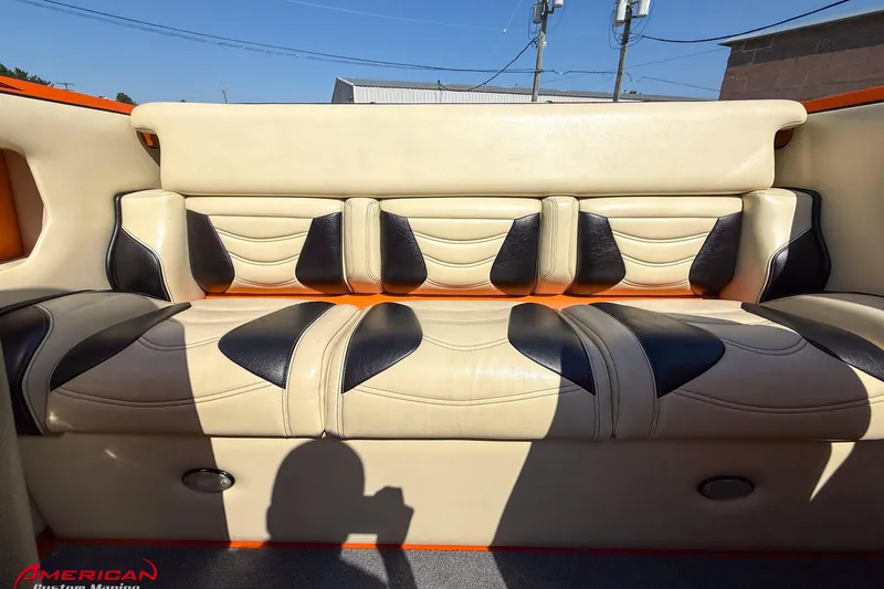  Yacht Photos Pics 2012 DCB 28 Extreme boat interior with beige and black leather seating.