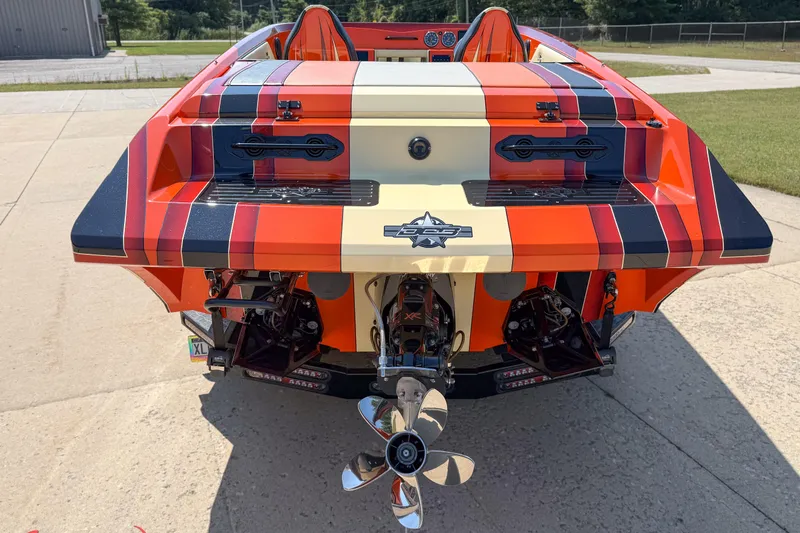  Yacht Photos Pics 2012 DCB 28 Extreme boat with vibrant striped design and dual propellers.