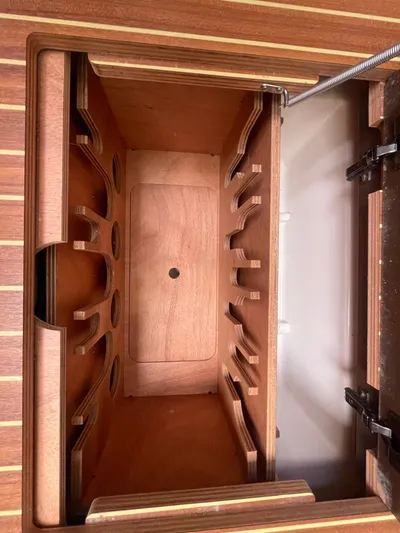 Send Me Yacht Photos Pics Wooden storage compartment inside a 2018 Dufour 460 Grand Large yacht.