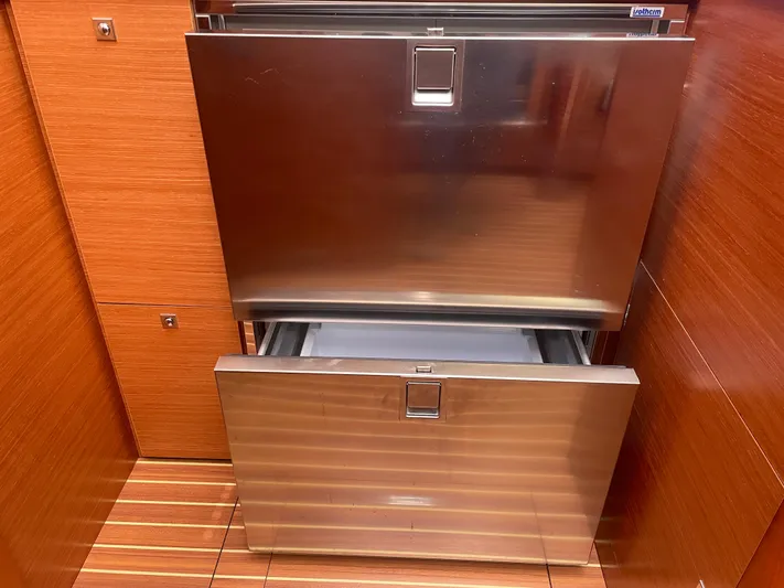Send Me Yacht Photos Pics Stainless steel drawers in a 2018 Dufour 460 Grand Large yacht interior.